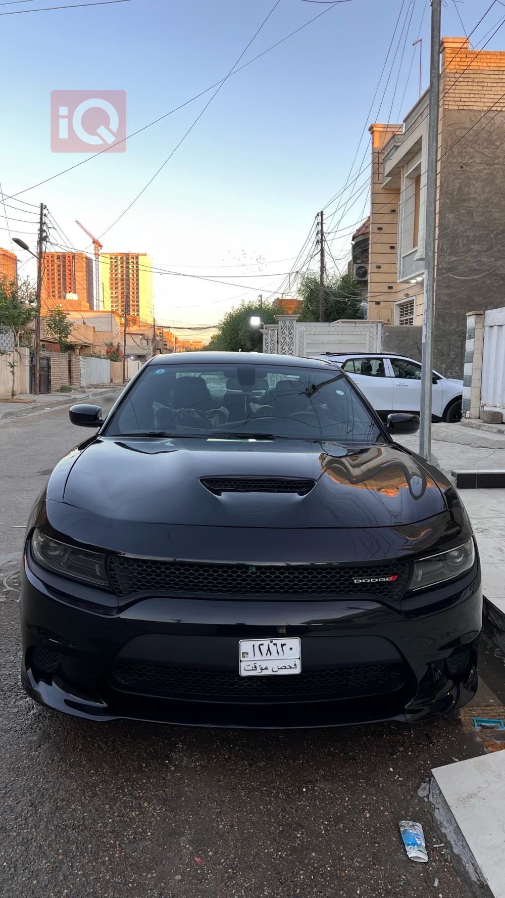 دۆج چارجەر